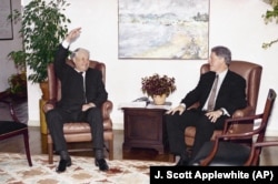 Yeltsin gestures as he talks with Clinton during their first bilateral meeting in Vancouver on April 3, 1993.