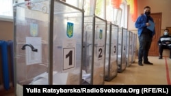 Ballot boxes at a polling station in the city of Dnipro on October 25.