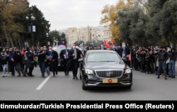 A car carries Erdogan through the streets of Baku The conflict is widely regarded as having strengthened Turkey's geopolitical position in the Caucasus, challenging traditional Russian dominance in the region.