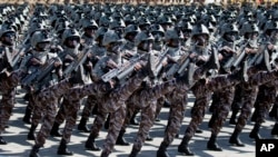 Soldiers march in a parade for the 70th anniversary of North Korea's founding day in Pyongyang in 2018. 