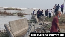 At least 70,000 people were forced out of their homes after the dam burst.