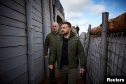 Ukraine's President Volodymyr Zelenskiy inspects new fortifications for Ukrainian soldiers in the Donetsk region on April 19.