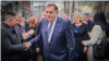 The president of Bosnian entity Republic of Srpska, Milod Dodik, greets supporters in Banja Luka after his sentence in Sarajevo on February 26.