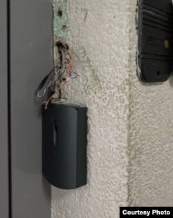 A broken lock after the raid of RFE/RL's offices.