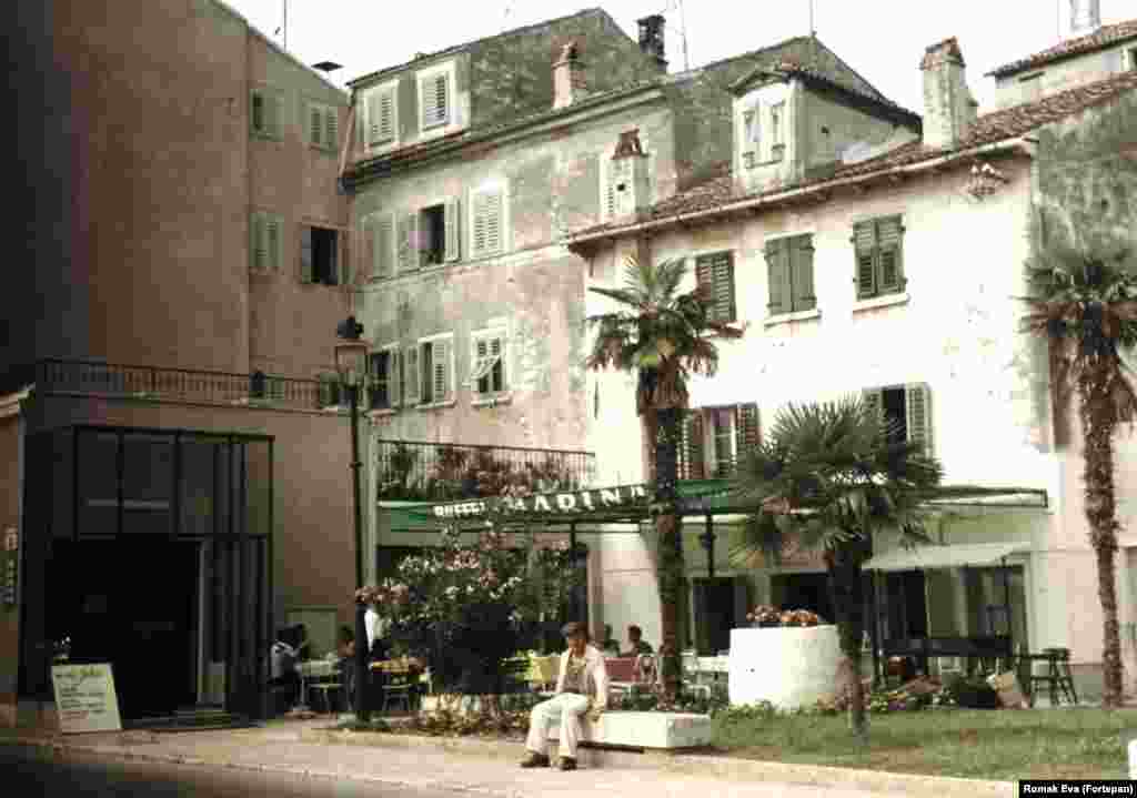 People enjoying an outdoor restaurant in Rovinj, Croatia, in 1969.