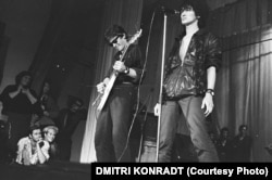 Viktor Tsoi (right) and Kino play at the Leningrad Rock Club in 1987 with two other stalwarts of the Leningrad scene looking on -- Joanna Stingray and Boris Grebenshchikov (bottom left). Tsoi would go on to become one of the most influential figures in the history of Russian popular music. Thirty-one years after his untimely death in a car crash in 1990, he still has legendary status throughout much of the former Soviet Union.