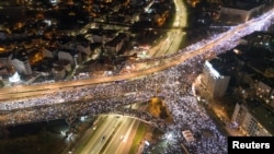 A drone shot shows students participating in a 24-hour blockade of a major junction during the ongoing protest in Belgrade on January 27.