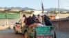 Relatives transport the body of a victim killed in sectarian attacks in Kurram, November 22, 2024.