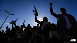 Huthi rebels rally in the Yemeni capital, Sanaa, on January 10.