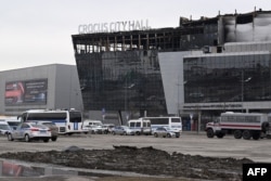 Russia says the deadly attack on the Crocus City Hall concert venue was carried out by four Tajik nationals.