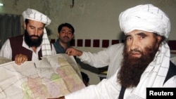 Jalaluddin Haqqani (right), whose militant network is aliied to the Taliban, may now be a target for U.S. raids.