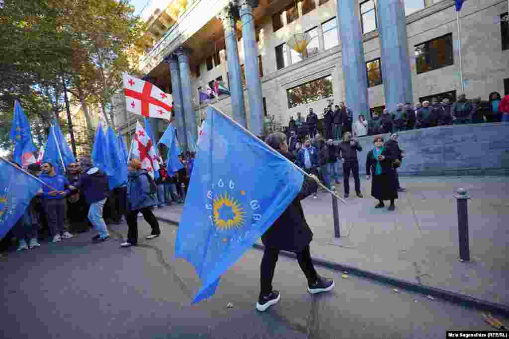 Supporters of the ruling party gather before the march.