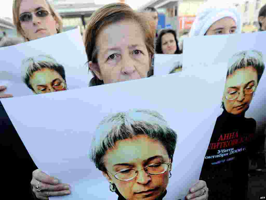 Human rights activists at a rally for Politkovskaya in Moscow in 2010