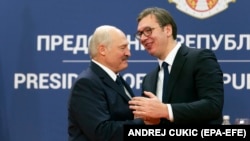 Belarusian President Aleyaksandr Lukashenka (left) is welcomed by his Serbian counterpart, Aleksandar Vucic, on a visit to Belgrade in December. 