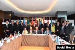 Participants at a meeting on a common alphabet for the Turkic nations pose for a photograph in Baku earlier this month.