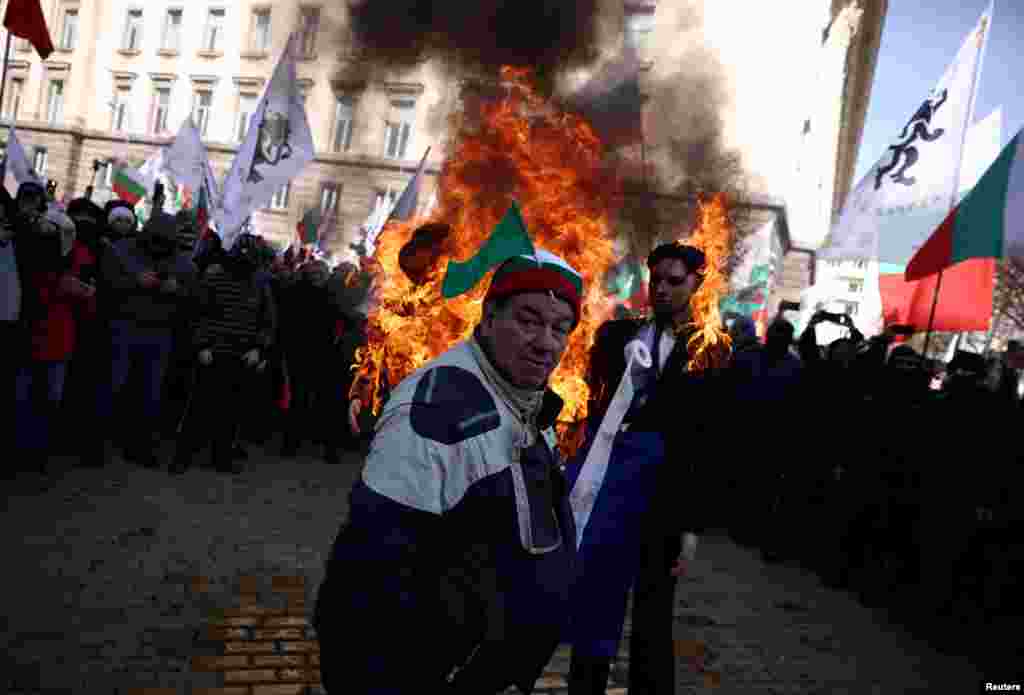 Supporters of Bulgaria's ultranationalist Revival party demonstrate in Sofia on February 22 against the country's plans to adopt the euro next year. 