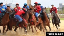 Kazakhstan (blue) prevailed as usual in kokpar, its version of goat-grabbing, by a score of 5-4 over Kyrgyzstan in the final at the World Nomad Games. 