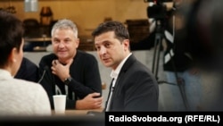 Ukrainian President Volodymyr Zelensky speaks to a group of reporters during a news conference in Kyiv on October 10.