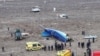 A drone view shows the crash site of a passenger plane near Aktau