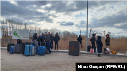 Ukrainian refugees at the Palanca border checkpoint in Moldova.