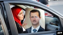 In Mizakh's world view, it's either President Bashar al-Assad or the Islamic State (IS) group who will rule Syria. There is no room for an alternative government.