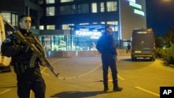 Kosovar police guard the hotel where the Israeli national soccer team is staying in Pristina.