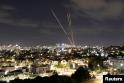 Israel's Iron Dome antimissile system intercepts Iranian missiles on October 1.