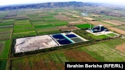 The nonfunctioning incinerator in Fier next to the growing waste landfill