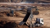 Machines extracting the rare earth mineral ilmenite from an open pit mine in Ukraine's central Kirovohrad region. 