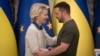 Ukrainian President Volodymyr Zelenskiy (right) and European Commission President Ursula von der Leyen greet each other in Kyiv on September 20.