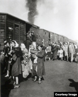 Polish Jews being loaded onto trains destined for the Treblinka extermination camp in 1942.