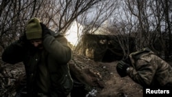 Outgunned and outmanned, exhausted Ukrainian troops are struggling to hold back Russian advance across the 1,100-kilometer front line. 