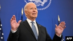 U.S. President Joe Biden speaks at the State Department in Washington on January 13.