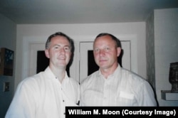 William M. Moon (left) poses with Russian Major General Vladimir Frolov, who was in charge of the security of Russia’s nuclear weapons.