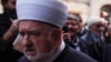 Former Grand Mufti Mustafa Ceric arrives for a ceremony at a mosque in Sarajevo in 2012.