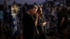 Relatives and other mourners of Israeli victims attend a ceremony at the Nova memorial near Kibbutz Reim in southern Israel on the first anniversary of the October 7, 2023, attack by Hamas.