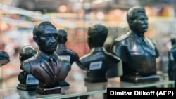 Busts of Russian President Vladimir Putin (left) and Soviet dictator Josef Stalin are seen among other items at a gift shop in Moscow on March 11.