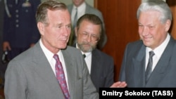 U.S. President George Bush (left) and Russian President Boris Yeltsin meet in Moscow in July 1991.