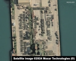 Military vehicles are shown lined up at Tartus, Syria, in this satellite image captured on December 17, 2024