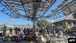 Passengers' belongings are scattered on the platform after an explosion at a railway station in Quetta, the capital of Pakistan's Balochistan Province, on November 9. 