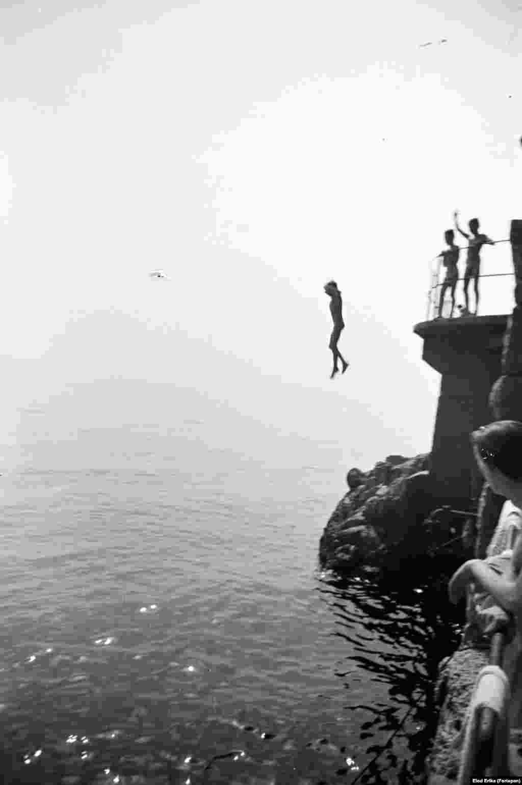 Children playing on a lazy day on the Adriatic Sea near the village of Lovran, in Croatia, in 1955.