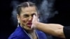 American athlete Jackie Cataline reacts after being hit by Hungary&#39;s Sheena Bathory during their Power Slap super heavyweight title bout in Riyadh, Saudi Arabia, on January 30. Bathory won the contest by unanimous decision.&nbsp;