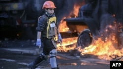 Twelve-year-old Roma Saveliyev is one of the most captivating interviewees in Evgeny Afineevsky's documentary Winter On Fire: Ukraine's Fight for Freedom, which has just been nominated for an Oscar. 