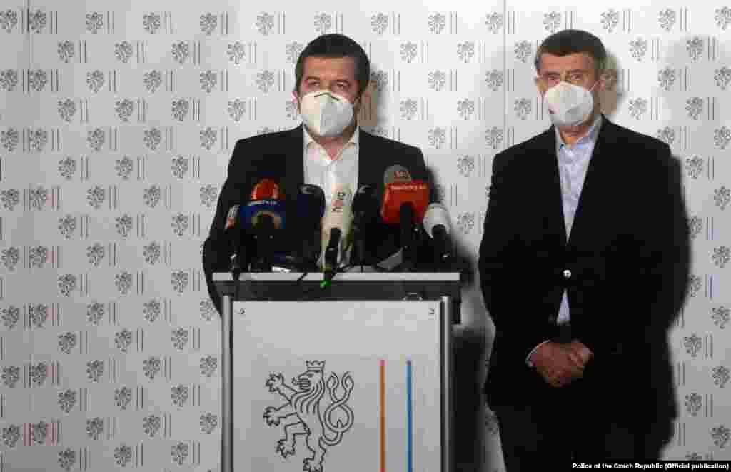 Czech Prime Minister Andrej Babis (right) and Interior Minister and acting Foreign Minister Jan Hamacek talk to reporters at an emergency press conference late on April 17. Babis blamed the blasts on the Russian military intelligence agency known as the GRU, and specifically on a secretive unit known as Unit 29155.