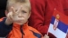 Bosnia-Herzegovina -- A child shows traditional Serb three-finger salute in Pale, Bosnia's Serb Republic, 08Sep2009