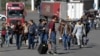 Russians cross the border at Verkhny Lars between Georgia and Russia in Georgia on September 27, 2022, shortly after Russian President Vladimir Putin announced the first partial mobilization of reservists for the war in Ukraine.