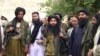 A video grab shows Mullah Fazlullah (C), the head of the Tehrik-e Taliban Pakistan (TTP) at an undisclosed location.