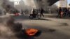 Iranian protesters block a highway amid angry protests against a fuel price increase, in Isfahan on November 16. 