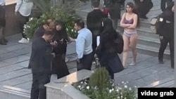 Iranian authorities arrested the female student after she stripped to her underwear on the street outside the university. 