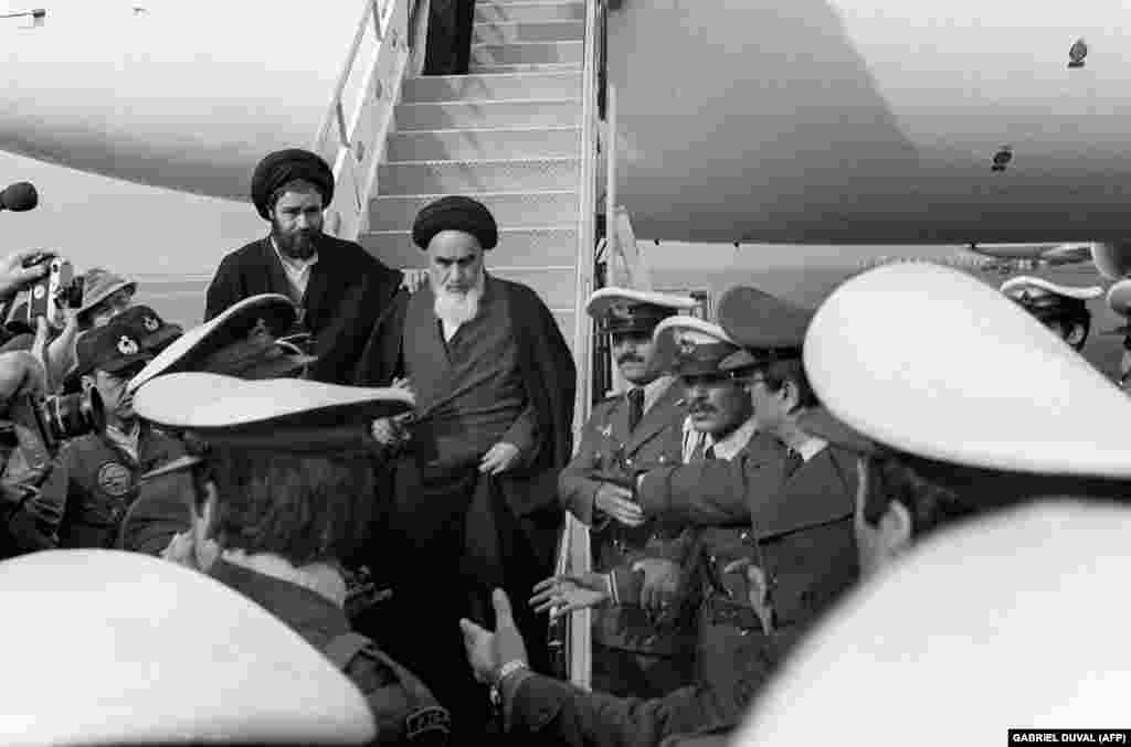 Ayatollah Ruhollah Khomeini arrives in Tehran on February 1, 1979. Some 120 journalists accompanied him on the flight from Paris.&nbsp;Although Iran&#39;s U.S.-backed Shah had already fled the country, Khomeini&#39;s return from exile is often seen as the true start of Iran&#39;s Islamic revolution.